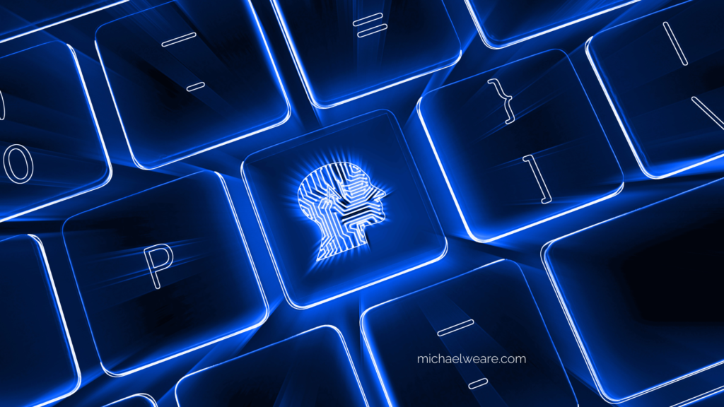 Digital human head icon on a glowing blue keyboard - michaelweare.com